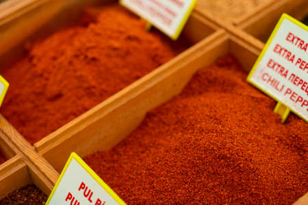 Assortment of Turkish spices and herbs in wooden bowls. Turkish market spices such as saffron, sumac and thyme. Cumin, rosemary and isotの写真素材