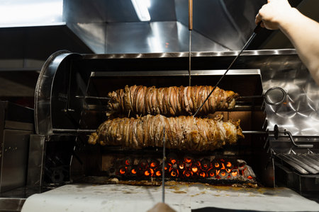 Kokorech lamb intestines roasting in Turkish market. Traditional street foodの写真素材