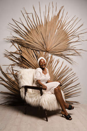 Black muslim woman surprised about sales. African girl shocked and laughsの写真素材