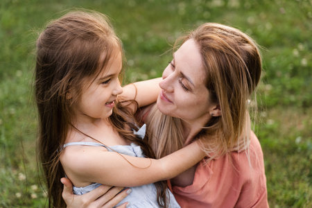 Daughter hug her mom. Hapiness emotion. Family values. Happy family lifestyle. Happiness and joy of...