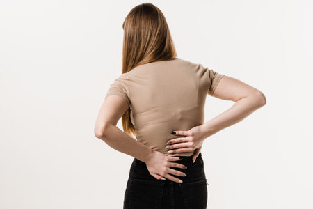 Rachiocampsis bachache of woman. Scoliosis is sideways curvature of the spine. Rheumatism and...