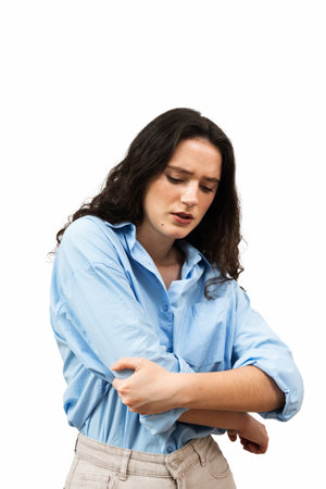 Attractive girl with pain and bruise in her arm due to an accident. Traumatology. Elbow injury.