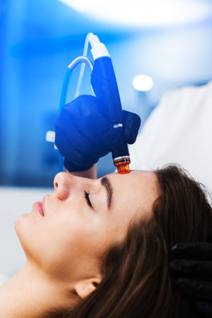 Using hydrafacial hardware cosmetology devise to improve skin condition. Rejuvenating skin with...