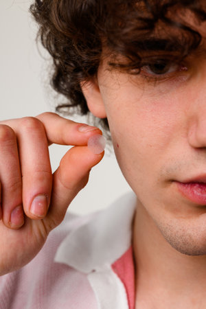 Dermatological acne patches or stickers to absorb excess fluids from pimple. Quick dealing with...