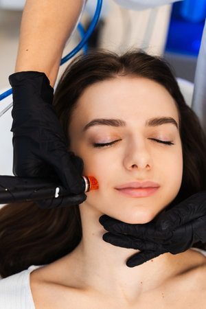 Hydrafacial facial cleansing skincare procedure to moisturizing facial skin. Cleansing skin with...