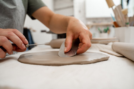 Removing air bubbles from clay before hand building. Preventing clay bodies from cracks by wedging....