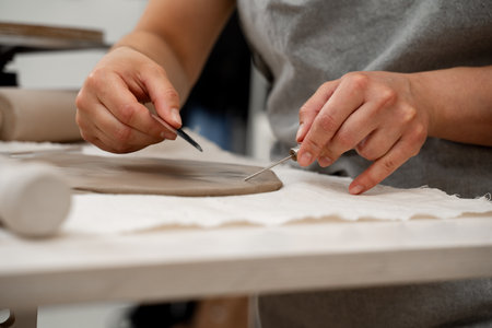 Preventing clay bodies from cracks by wedging. Making pliable clay without air pockets. Removing air...