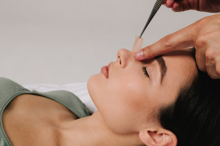 Beneficial nose taping after rhinoplasty procedure to support shape. Bandaging nose after surgery to...