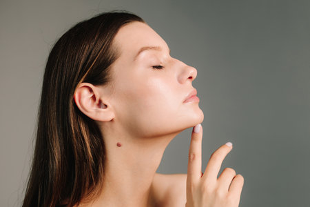Contouring of the chin and angular jaws. Correcting the shape of the face by doctor. Aesthetic beauty treatment. Improved shape of the faceの写真素材