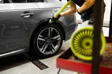 Compressed air to blow moisture from tight wheel areas. Wheels Drying with Air Blower. High-pressure...
