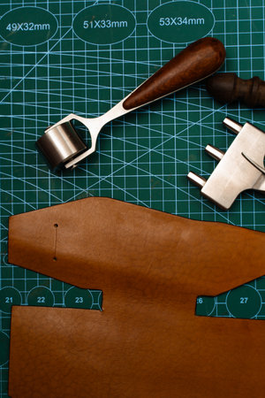 Leathercraft tools including knives, chisels, and cutters for artisan crafting. Craftsman...