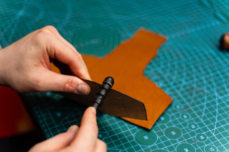 Leather burnishing creates polished edges that resist wear. Using a burnisher, artisans refine...