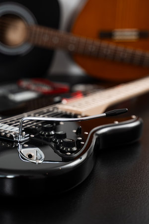 Electric guitar setup with repair tools. Electric guitar bridge adjustment with tremolo installation...