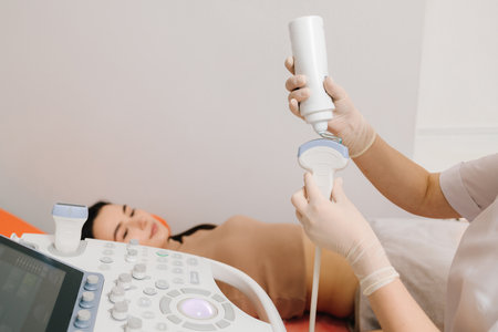 Applying gel to the ultrasound device eliminates air gaps for better sound transmission. Ultrasound Gel Application. Ultrasound gel is applied to the transducer for effective soundwave conductionの写真素材