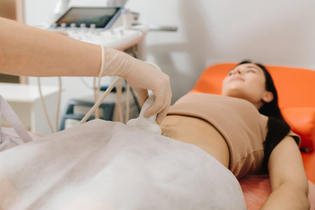 Applying gel to the ultrasound device eliminates air gaps for better sound transmission. Ultrasound Gel Application. Ultrasound gel is applied to the transducer for effective soundwave conductionの写真素材