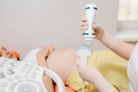 Ultrasound Gel Application. Ultrasound gel is applied to the transducer for effective soundwave conduction. Applying gel to the ultrasound device eliminates air gaps for better sound transmissionの写真素材