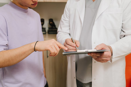 Patient visits urologist for consultation on urinary health issuesの写真素材