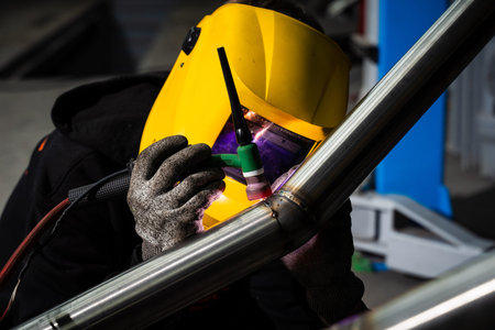 Automotive TIG welding on exhaust pipe using argon shielding and tungsten