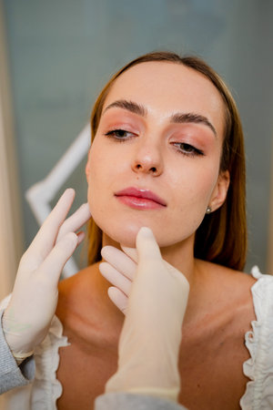 Facial shaping with chin and angular jaw correction in aesthetic clinic