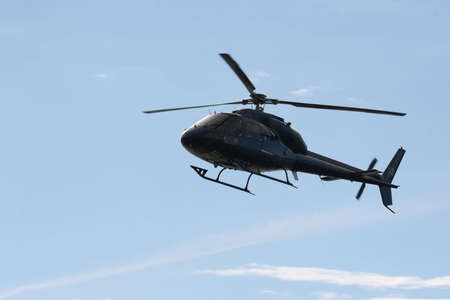 Helecopter comming in to land at a open day