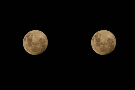 two moons good for a desktop backgroundの写真素材