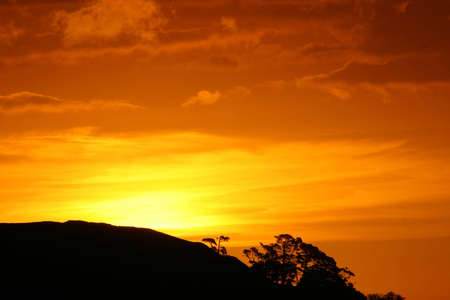 Gorgeous orange sunset over mount wellington aucklandの写真素材