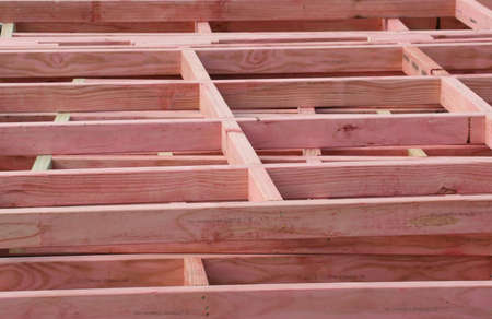 wood framing for the walls of a new houseの写真素材