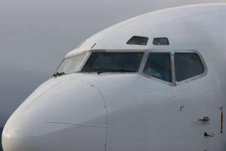 The front of an airplane with pilotの写真素材
