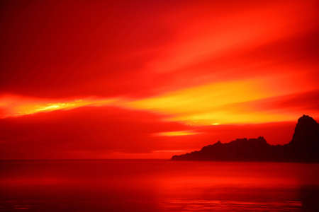 Bright sunset at Karekare beach west aucklandの写真素材