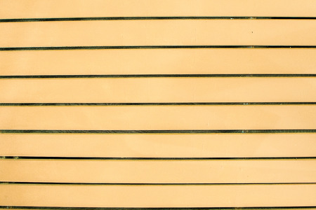 Beautiful orange wood wall backgroundの写真素材