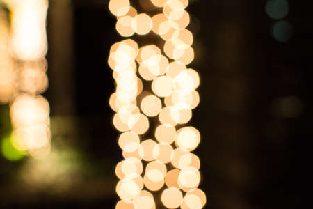 Colorful beautiful blurred bokeh background. Glitter multi colored light spots on light backdrop, defocusedの写真素材