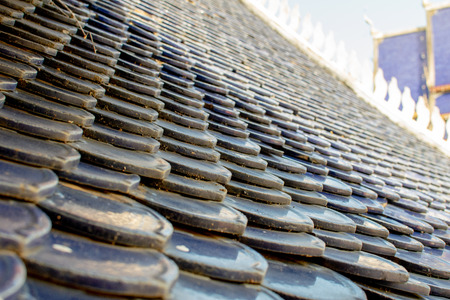 Tile sheets are stacked to the roof.の写真素材