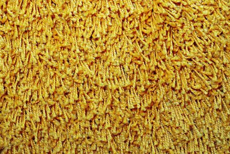 Rough yellow carpet texture for backgroundの写真素材