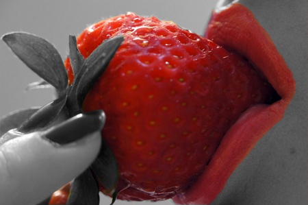 strawberry in black and redの写真素材