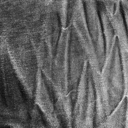 Denim jeans texture or denim jeans background with old torn. Old grunge vintage denim jeans fashion design. Dark edged.の写真素材