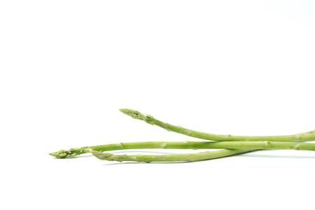 Fresh green asparagus on white backgroundの写真素材