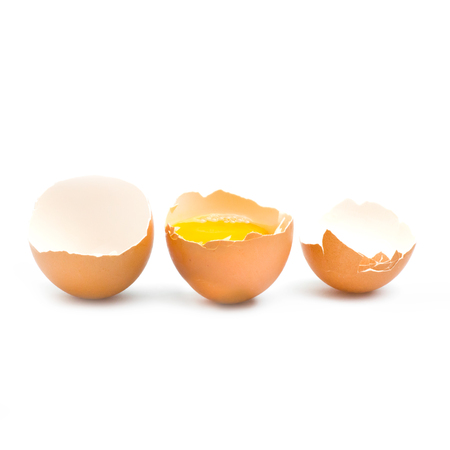 Isolated set of hen eggs and broken eggs on white background