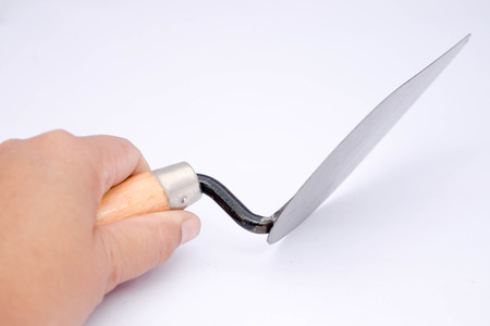 Cement trowel in hand.の写真素材