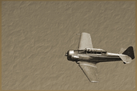 a vintage fighter plane on a sepia backgroundのeditorial素材