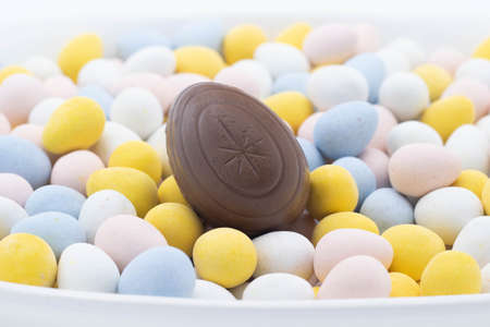 cadbury creme egg on top of candy eggsの写真素材