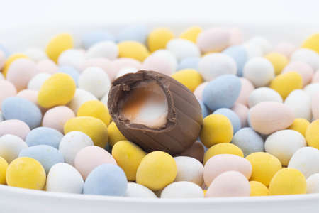 cadbury creme egg on top of candy eggsの写真素材