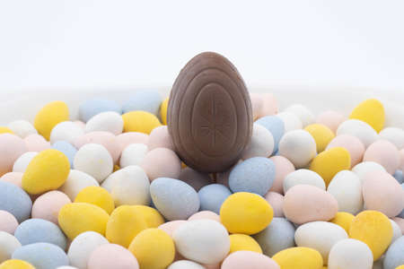 cadbury creme egg on top of candy eggsの写真素材
