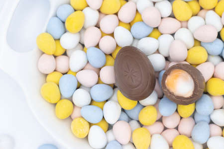 cadbury creme egg on top of candy eggsの写真素材