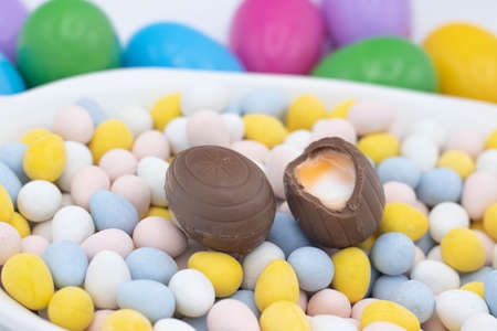 cadbury creme egg on top of candy eggsの写真素材