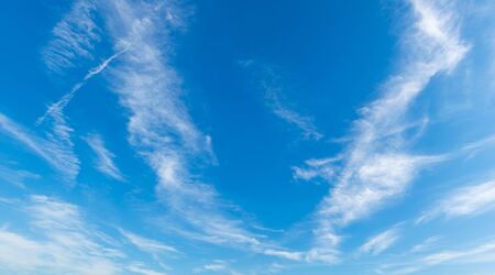 Abstract white fluffy clouds and  Blue sky in sunny day background.Natural Celestial World  concept with blue sky and clouds  Use as background.の写真素材