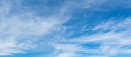 Abstract white fluffy clouds and  Blue sky in sunny day background.Natural Celestial World  concept with blue sky and clouds  Use as background.の写真素材