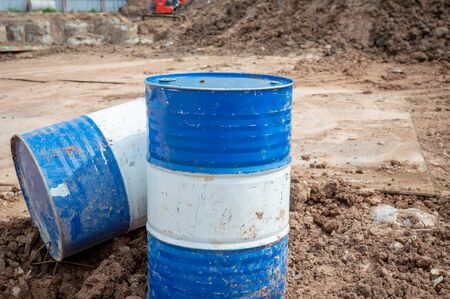 Industry oil barrels or chemical drums stacked up.