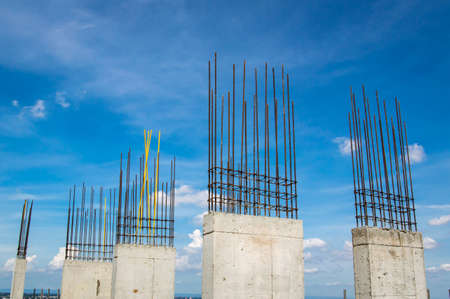 Steel reinforce in concrete column.Steel grid on the construction site.Reinforcement of concrete work. Using steel wire for securing steel bars with wire rod for reinforcement of concreteの写真素材