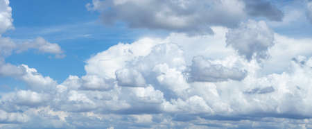blue sky background with tiny clouds. panorama white fluffy clouds in the blue sky.Beautiful vast...