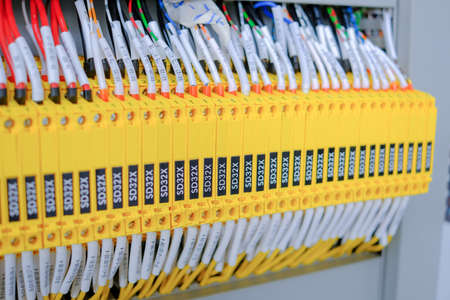 Wiring PLC Control panel with wires industrial factory.Wiring terminals in the electrical Cabinet....